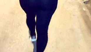 curvy mature whore flashes huge ass in see-through leggings on street