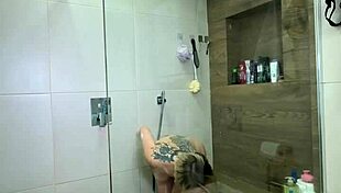 curvy ebony babe rides dildo deep in steamy shower fun