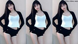 cute chinese girl dances wildly on sexy roller coaster thrill