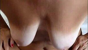 Old lady massages shaved pussy and natural tits to real orgasm closeup