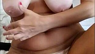 Old lady massages shaved pussy and natural tits to real orgasm closeup