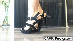 capri slides fingers into shaved pussy while rocking high heels