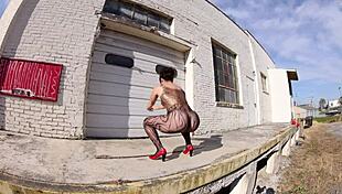 dig this thong bodysuit chick strutting confidently along the docks