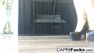 capri slides fingers into shaved pussy while rocking high heels