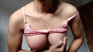 i'm mitha waria shemale stroking my cock in pink bra till i cum