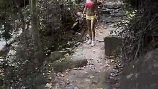 monika fox pink top yellow shorts strips jungle waterfalls nude