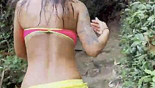 monika fox pink top yellow shorts strips jungle waterfalls nude