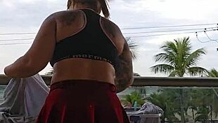 flashing my ass from the balcony skirt up total thrill 😜🍑