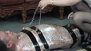 Japanese Mistress Tomoki Torments Nipples and Cocks of Bound Mummified Masochist Slaves