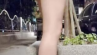 Taiwanese crossdresser flashes outdoors in flats cums on legs