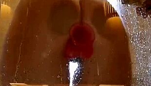 Pretty girl teases appetizing ass in shower with pink toy