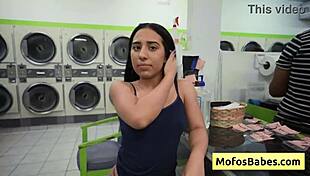 Sneaky teen brunette slurps wet cock in public laundry spin cycle