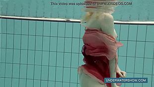 Katya Okuneva, tease us in red dress by pool?