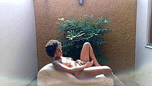 Curvy ebony temptress bares her assets for outdoor solo play with well-endowed partner