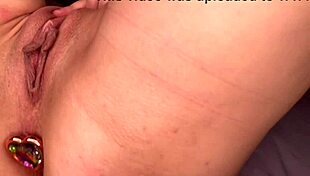 Italian milf fingers wet shaved pussy and stretches ass with buttplug solo