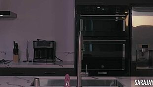 Sara Jay fingers her huge tits pussy on kitchen counter to orgasm