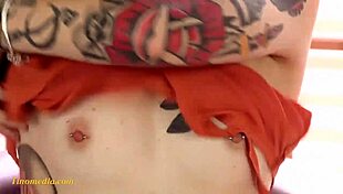 Skinny redhead 18+ teen with small tits and tattoos looks tempting