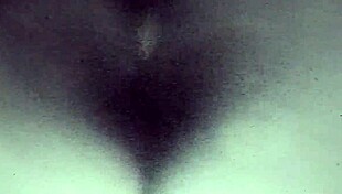 bitch spreads lips showing off her huge hairy pussy up close