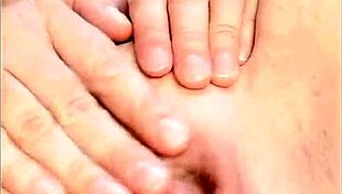 mature babe spreads shaved pussy wide for closeup fingering tease