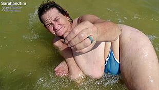 imagine plump granny's huge saggy tits breaking out on beach close up