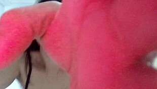 Asian shemale with big ass tits and monster cock strokes hard solo on webcam in her bed masturbating wet.