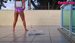 Brunette's shorts wedged deep in her fat ass during outdoor training!