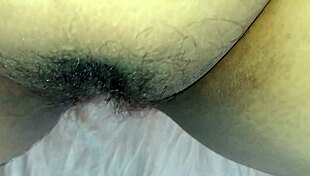 Chubby latina spreads her huge hairy wet pussy wide