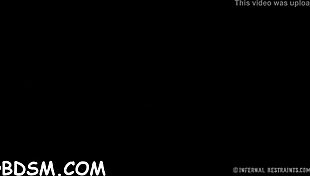 Bounded beauty leaks wet pussy juices while group fucks her hard in bondage slut scene with cock sucking