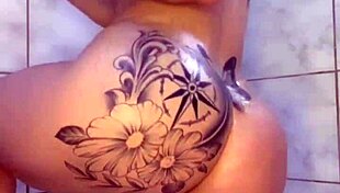 latin babe dances then fingers tight ass under shower