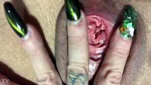 Babe spreads legs fingering wet pussy and gaping tight asshole wide.