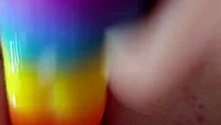 Chubby brunette gapes ass with rainbow dildo creampie