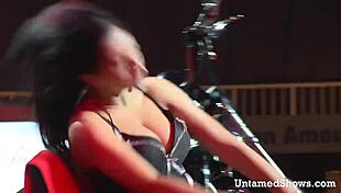 Watch this naughty brunette slowly strip and dance out of her clothes