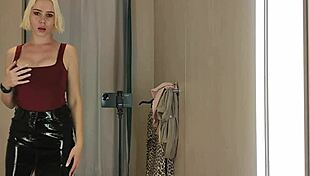 big tits babe flashes pussy in see-through latex dressing room haul