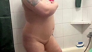 chubby tattooed babe showers wet pussy teasing big natural tits