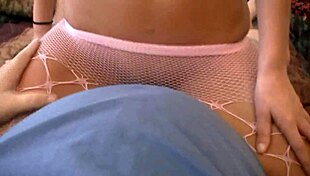 pretty brunette jenny welch rides cock through pink fishnet pantyhose