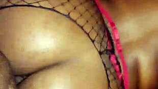 stockings hugging her thighs while she strokes that thick cock craving more