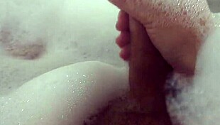 i finger my dripping pussy deep in steamy bubble bath suds everywhere