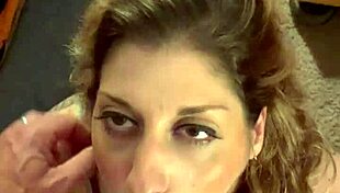 Hey, check out this sexy milf wife deepthroating her hubby's throbbing cock till he explodes