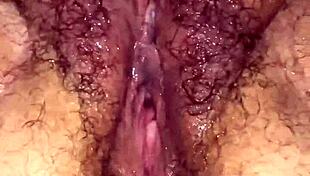 Hairy BBW milf squirts from intense fisting