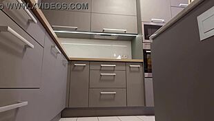 Long-Haired Blonde Coed in Miniskirt and Heels Flashes Ass and Pussy in Kitchen.