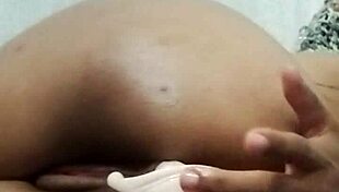 Latina brunette stretches her big ass while masturbating solo