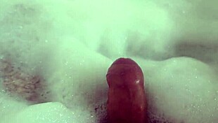i finger my dripping pussy deep in steamy bubble bath suds everywhere