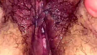 Hairy BBW milf squirts from intense fisting