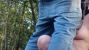 slave flashes natural tits during outdoor forest exhibition