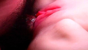 My dick slides deep into her tight shaved pussy