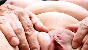 mature pussy spread wide open in close up view