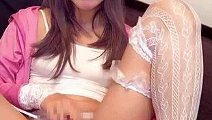 Crossdressing ladyboy masturbates pussy with net on crotch closeup