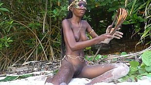 skinny african girl NAKED cooks medicine for granny in wild forest kitchen scene