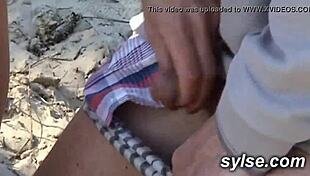 French milf flashes toys on beach drawing voyeurs then straps on for lesbian outdoor orgy