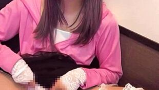 Crossdressing ladyboy masturbates pussy with net on crotch closeup